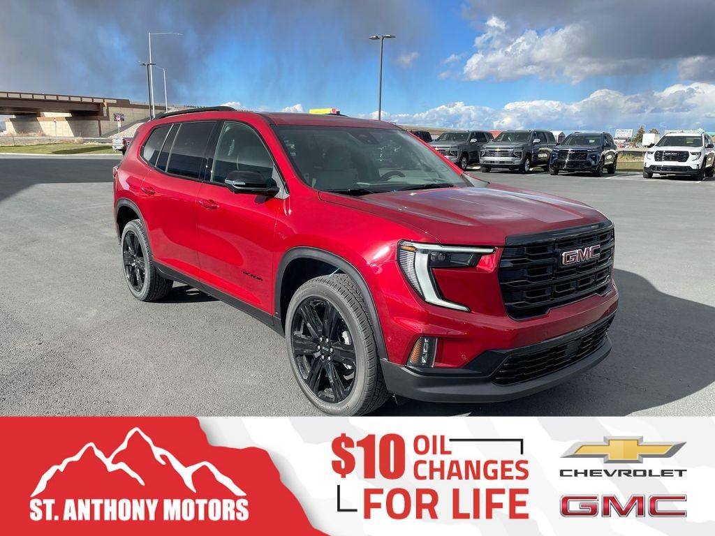 2026 GMC Acadia Elevation in Volcanic Red Tintcoat — front three-quarter view