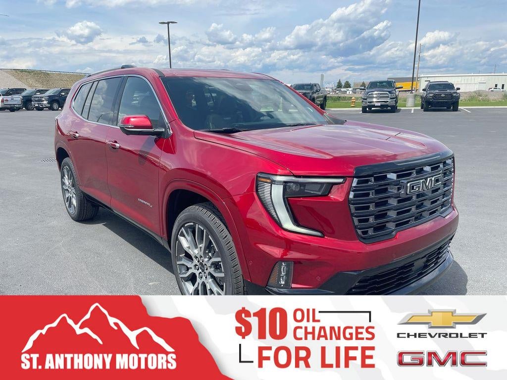 2026 GMC Acadia Denali Ultimate in Volcanic Red Tintcoat — front three-quarter view