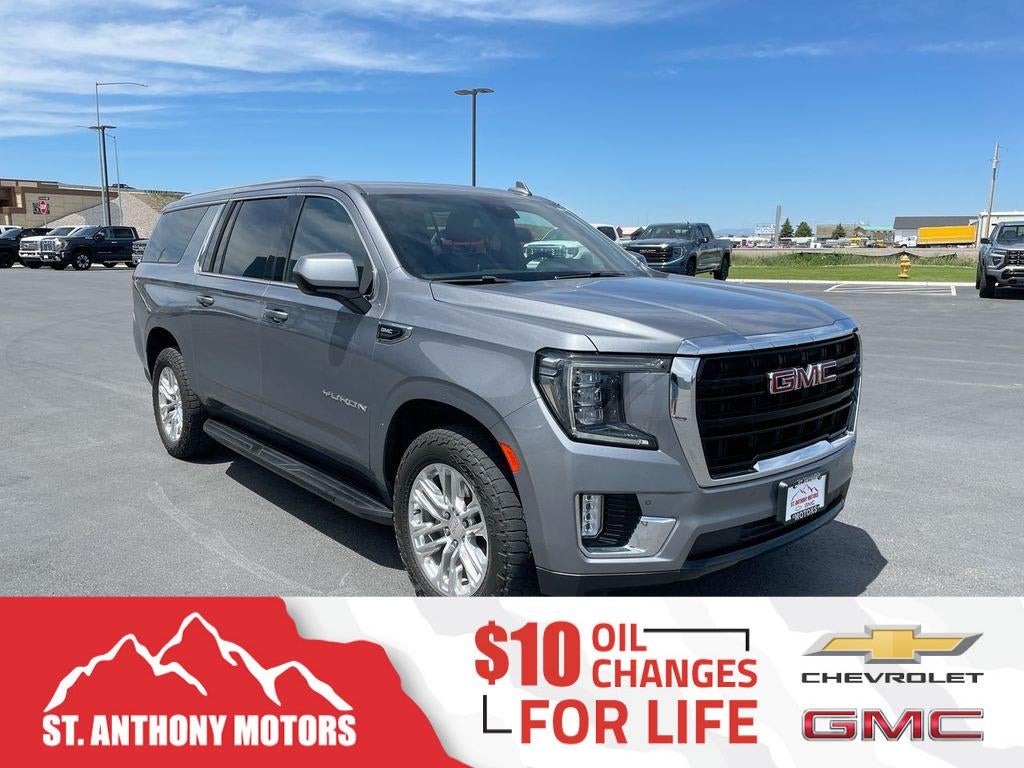 2022 GMC Yukon XL SLE in Satin Steel Metallic — front three-quarter view