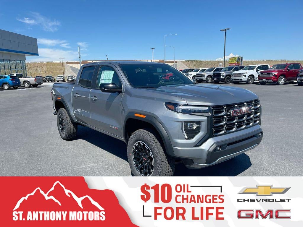 2026 GMC Canyon AT4 in Sterling Metallic — front three-quarter view