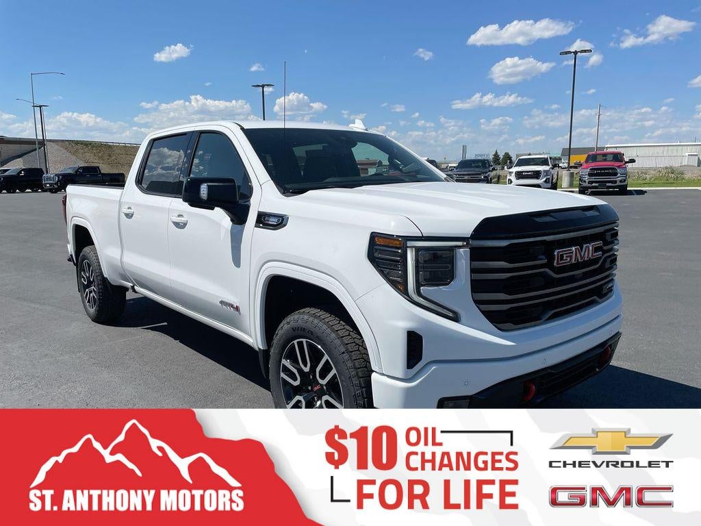 2026 GMC Sierra 1500 AT4 in Summit White — front three-quarter view
