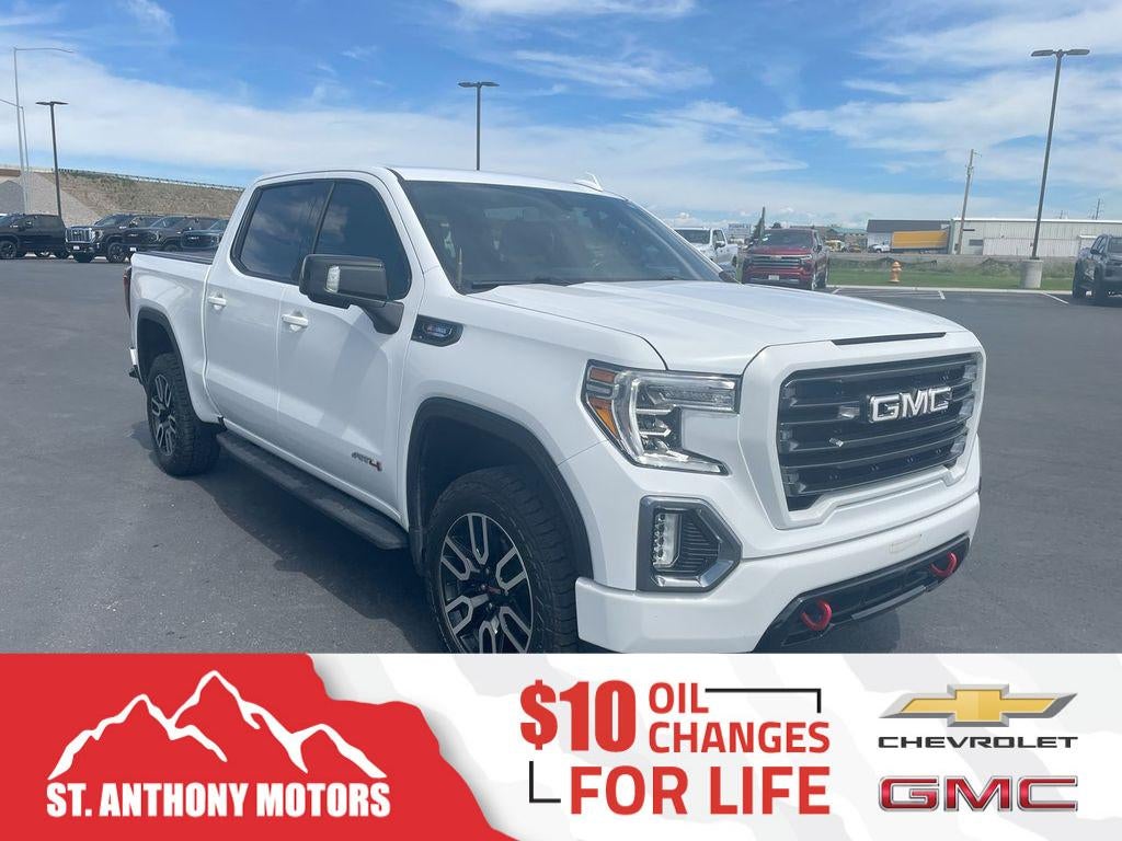 2021 GMC Sierra 1500 AT4 in Summit White — front three-quarter view
