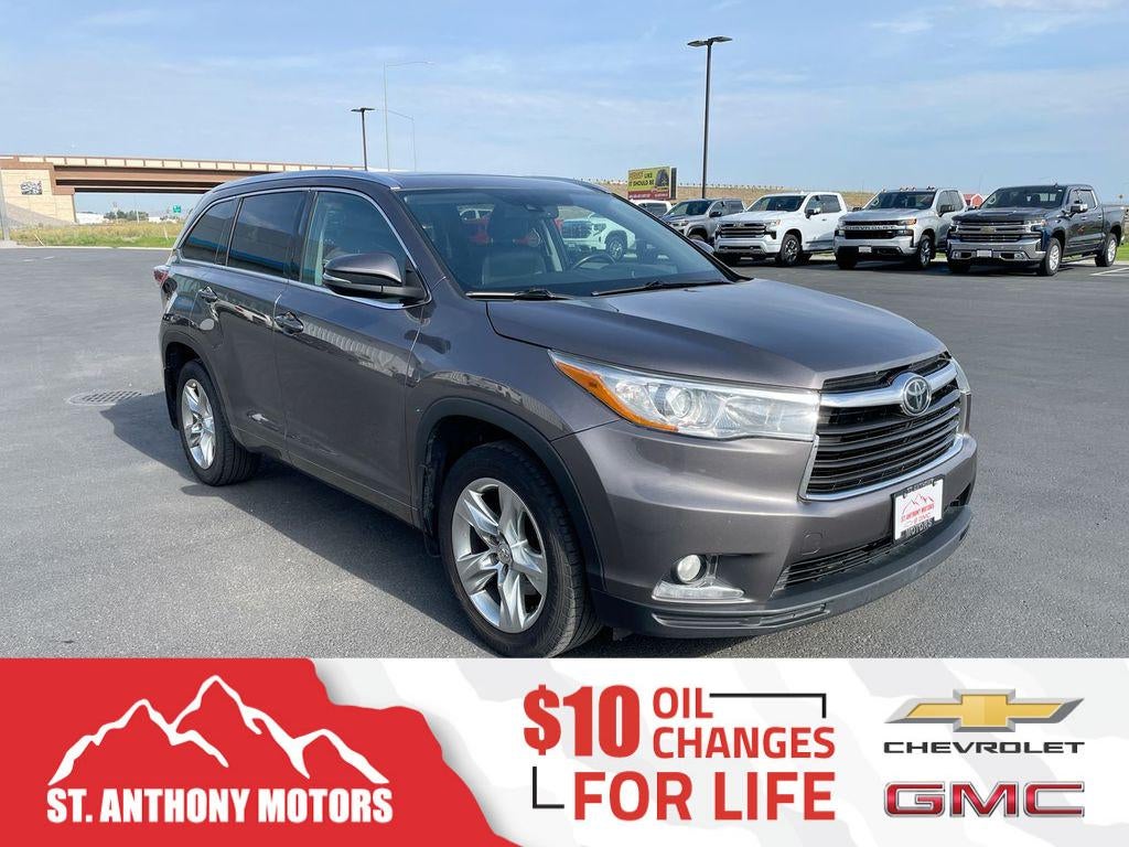 2015 Toyota Highlander Limited in Mocha — front three-quarter view